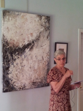 Abstract acrylic painting, large size, with exhibit visitor standing in front.